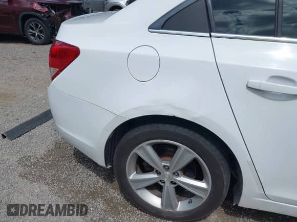 2013 Chevrolet Cruze 2LT z VIN 1G1PE5SB2D7138477, wystawiony jako IAAI lot #43074213 z przebiegiem 231 515 mil mil oraz . Historia ofert i sprzedaży dostępna na DreamBid. Obrazek 19.