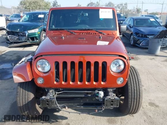 2014 Jeep Wrangler Sahara with VIN 1C4AJWBG4EL158586, listed as a IAAI auction lot 43220489 with 36,662 mi miles and . Bid and sale history available at DreamBid. Image 13.