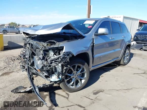 2020 Jeep Grand Cherokee Summit with VIN 1C4RJFJG2LC173184, listed as a IAAI auction lot 41343182 with 70,192 mi miles and . Bid and sale history available at DreamBid. Image 17.
