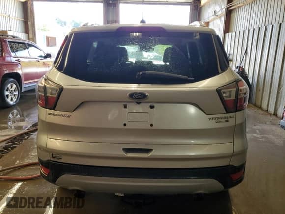 2017 Ford Escape Titanium with VIN 1FMCU9J95HUA02877, listed as a Copart auction lot 81366515 with 166,622 mi miles and Clean title. Bid and sale history available at DreamBid. Image 6.
