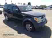 2007 Dodge Nitro SXT with VIN 1D8GT28K77W659757, listed as a Copart auction lot 63344815 with 140,843 mi miles and Salvage title. Bid and sale history available at DreamBid. Image 4.