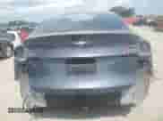 2023 Tesla Model Y with VIN 7SAYGDED6PF960648, listed as a Copart auction lot 67447254 with 18,536 mi miles and Salvage title. Bid and sale history available at DreamBid. Image 6.