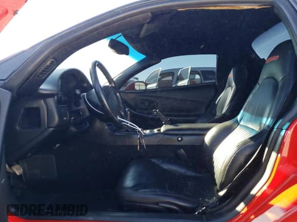 2001 Chevrolet Corvette Z06 with VIN 1G1YY12S015111810, listed as a Copart auction lot 38849954 with 76,940 mi miles and Salvage title. Bid and sale history available at DreamBid. Image 7.