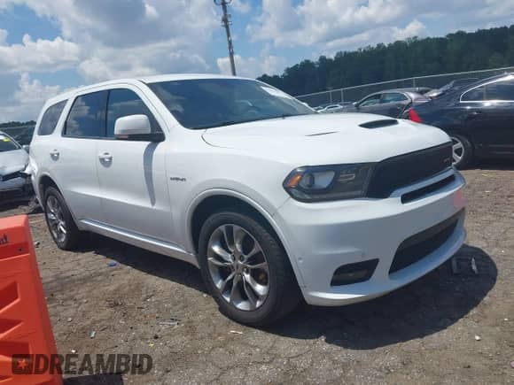 2020 Dodge Durango R/T with VIN 1C4SDHCT6LC306835, listed as a IAAI auction lot 42803407 with 129,704 mi miles and . Bid and sale history available at DreamBid. Image 1.