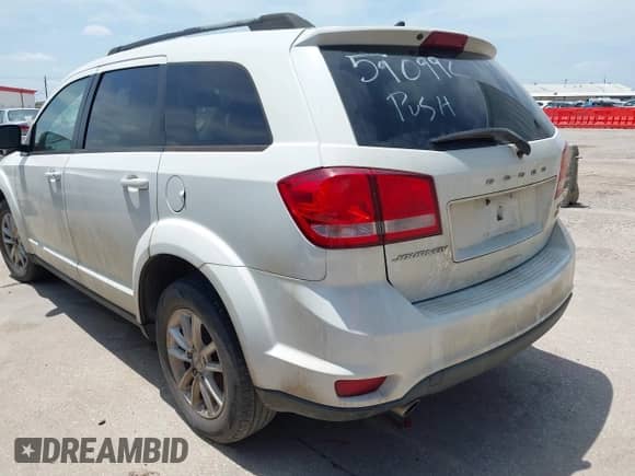 2017 Dodge Journey SXT with VIN 3C4PDCBG4HT590992, listed as a IAAI auction lot 42378549 with 275,884 mi miles and . Bid and sale history available at DreamBid. Image 3.