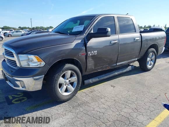 2015 Ram 1500 Outdoorsman with VIN 1C6RR7LM1FS683898, listed as a IAAI auction lot 41858781 with 202,530 mi miles and . Bid and sale history available at DreamBid. Image 2.