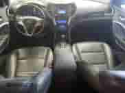2013 Hyundai Santa Fe Sport z VIN 5XYZUDLA9DG123044, wystawiony jako Copart lot #68886945 z przebiegiem 193 263 mil mil oraz Czysty tytuł • Clean title. Historia ofert i sprzedaży dostępna na DreamBid. Obrazek 8.