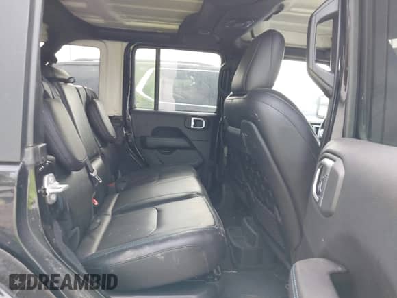 2022 Jeep Wrangler Unlimited Rubicon with VIN 1C4JJXR63NW228550, listed as a IAAI auction lot 41957313 with 15,860 mi miles and . Bid and sale history available at DreamBid. Image 8.