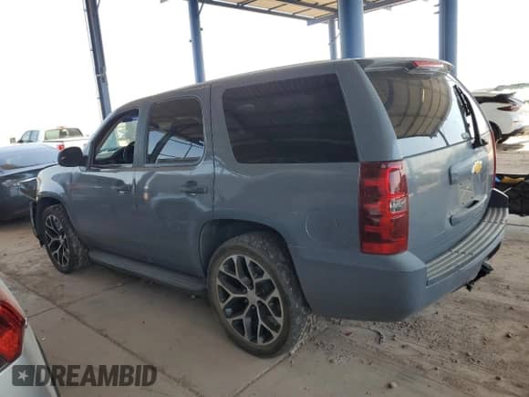 2013 Chevrolet Tahoe Commercial with VIN 1GNLC2E0XDR266045, listed as a Copart auction lot 68174475 with 157,407 mi miles and Salvage title. Bid and sale history available at DreamBid. Image 2.