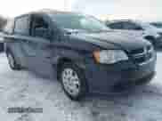 2014 Dodge Grand Caravan SXT with VIN 2C4RDGBGXER138141, listed as a IAAI auction lot 41201505 with 156,445 mi miles and . Bid and sale history available at DreamBid. Image 1.