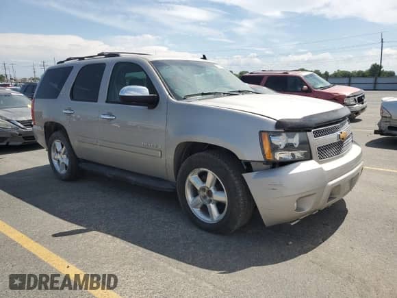 2007 Chevrolet Tahoe LT with VIN 1GNFK13047J352905, listed as a Copart auction lot 60530455 with 189,174 mi miles and Salvage title. Bid and sale history available at DreamBid. Image 4.