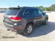 2014 Jeep Grand Cherokee Laredo with VIN 1C4RJEAG8EC141157, listed as a IAAI auction lot 43370151 with 163,137 mi miles and . Bid and sale history available at DreamBid. Image 4.