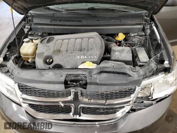 2015 Dodge Journey SXT с VIN 3C4PDCCG9FT722284, выставлен на аукционе Copart как лот 84937724 с пробегом 210 747 миль миль и Списание • Salvage title. История ставок и продаж доступна на DreamBid. Изображение 12.