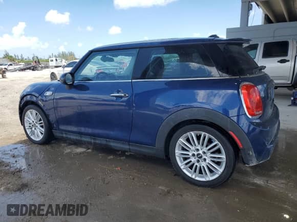 2014 MINI Hardtop S with VIN WMWXM7C52ET986993, listed as a Copart auction lot 61662055 with 99,544 mi miles and Clean title. Bid and sale history available at DreamBid. Image 2.