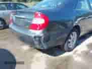 2004 Toyota Camry LE with VIN JTDBE32K540247403, listed as a IAAI auction lot 43148950 with 173,829 mi miles and . Bid and sale history available at DreamBid. Image 18.