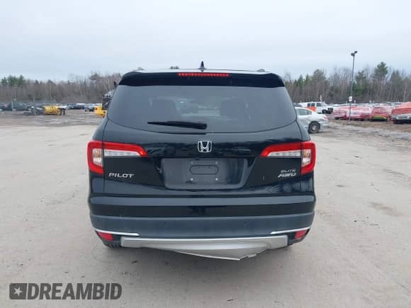 2020 Honda Pilot Elite z VIN 5FNYF6H0XLB003034, wystawiony jako IAAI lot #41945519 z przebiegiem 47 605 mil mil oraz . Historia ofert i sprzedaży dostępna na DreamBid. Obrazek 16.