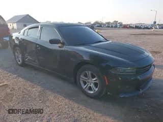 2020 Dodge Charger SXT with VIN 2C3CDXBG0LH213281, listed as a IAAI auction lot 43004479 with 104,683 mi miles and . Bid and sale history available at DreamBid. Image 1.