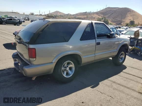 2000 Chevrolet Blazer LS с VIN 1GNCS18W1YK259268, выставлен на аукционе Copart как лот 80156565 с пробегом 287 216 миль миль и Списание • Salvage title. История ставок и продаж доступна на DreamBid. Изображение 3.