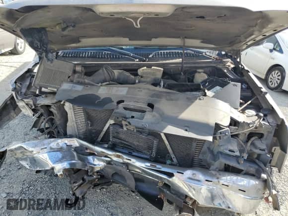 2003 Chevrolet Silverado 2500HD LT z VIN 1GCHK29153E171662, wystawiony jako Copart lot #80114585 z przebiegiem Nie podano mil oraz Szkoda całkowita • Salvage title. Historia ofert i sprzedaży dostępna na DreamBid. Obrazek 11.