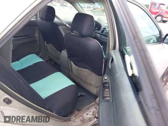 2005 Toyota Camry STD with VIN 4T1BE32K85U974198, listed as a IAAI auction lot 42879062 with 269,935 mi miles and . Bid and sale history available at DreamBid. Image 8.