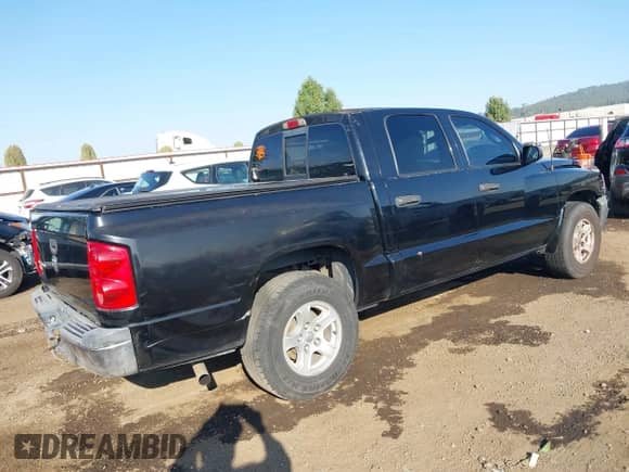 2005 Dodge Dakota SLT with VIN 1D7HW48K95S294045, listed as a IAAI auction lot 43269758 with Not provided miles and . Bid and sale history available at DreamBid. Image 4.
