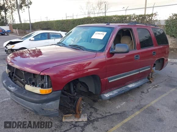 2005 Chevrolet Tahoe LS with VIN 1GNEC13T35J229998, listed as a IAAI auction lot 41586990 with Not provided miles and . Bid and sale history available at DreamBid. Image 2.