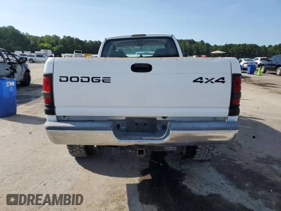 2001 Dodge 2500 with VIN 1B7KF23W01J512727, listed as a Copart auction lot 63804254 with 148,220 mi miles and Salvage title. Bid and sale history available at DreamBid. Image 6.