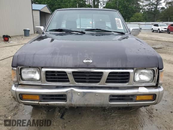 1995 Nissan Frontier z VIN 1N6SD11S3SC408509, wystawiony jako Copart lot #60853665 z przebiegiem 166 876 mil mil oraz Szkoda całkowita • Salvage title. Historia ofert i sprzedaży dostępna na DreamBid. Obrazek 5.