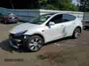 2023 Tesla Model Y Long Range with VIN 7SAYGDEE1PF764576, listed as a Copart auction lot 67882145 with 40,313 mi miles and Salvage title. Bid and sale history available at DreamBid. Image 1.