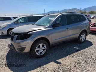2012 Hyundai Santa Fe GLS с VIN 5XYZGDAB8CG123957, выставлен на аукционе Copart как лот 68682695 с пробегом 148 706 миль миль и Списание • Salvage title. История ставок и продаж доступна на DreamBid. Изображение 1.