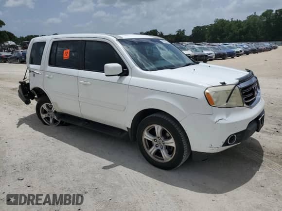 2015 Honda Pilot EX-L with VIN 5FNYF3H77FB007042, listed as a Copart auction lot 60122705 with 183,727 mi miles and Salvage title. Bid and sale history available at DreamBid. Image 4.