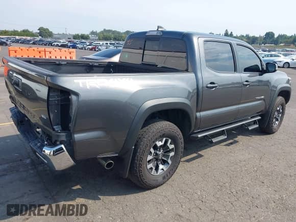 2019 Toyota Tacoma SR z VIN 3TMCZ5AN6KM229020, wystawiony jako IAAI lot #43090158 z przebiegiem 117 151 mil mil oraz . Historia ofert i sprzedaży dostępna na DreamBid. Obrazek 4.