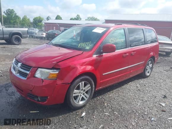 2010 Dodge Grand Caravan SXT with VIN 2D4RN5DX0AR134272, listed as a IAAI auction lot 42451426 with 106,397 mi miles and . Bid and sale history available at DreamBid. Image 2.