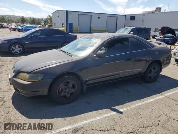 2000 Honda Accord EX with VIN 1HGCG2251YA008385, listed as a Copart auction lot 69882435 with 275,241 mi miles and Salvage title. Bid and sale history available at DreamBid. Image 1.