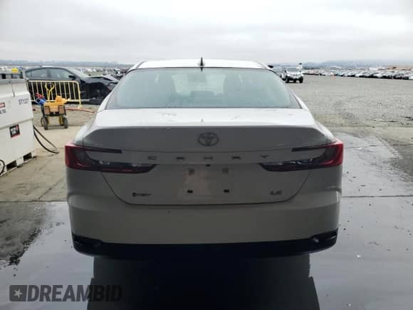 2025 Toyota Camry LE с VIN 4T1DAACKXSU059677, выставлен на аукционе Copart как лот 90298405 с пробегом 26 148 миль миль и Чистый • Clean title. История ставок и продаж доступна на DreamBid. Изображение 6.