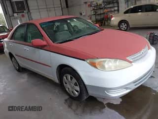 2003 Toyota Camry LE with VIN 4T1BE32K33U673674, listed as a IAAI auction lot 43069726 with 238,804 mi miles and . Bid and sale history available at DreamBid. Image 1.