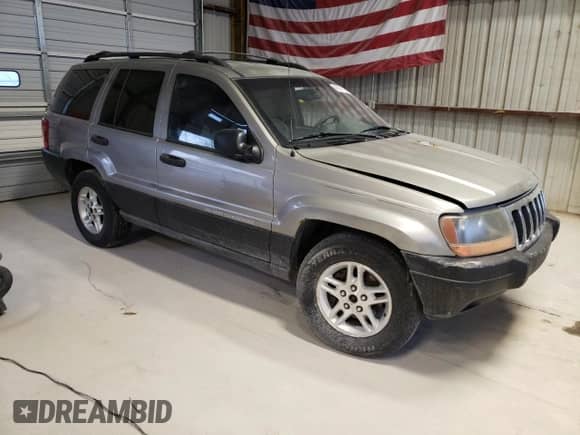 1999 Jeep Grand Cherokee Laredo с VIN 1J4G258S1XC668517, выставлен на аукционе Copart как лот 79958454 с пробегом Не указан миль и Списание • Salvage title. История ставок и продаж доступна на DreamBid. Изображение 4.