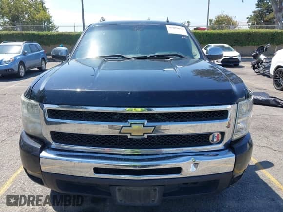 2011 Chevrolet Silverado 1500 LT z VIN 3GCPCSE0XBG111356, wystawiony jako IAAI lot #43079067 z przebiegiem 179 497 mil mil oraz . Historia ofert i sprzedaży dostępna na DreamBid. Obrazek 13.