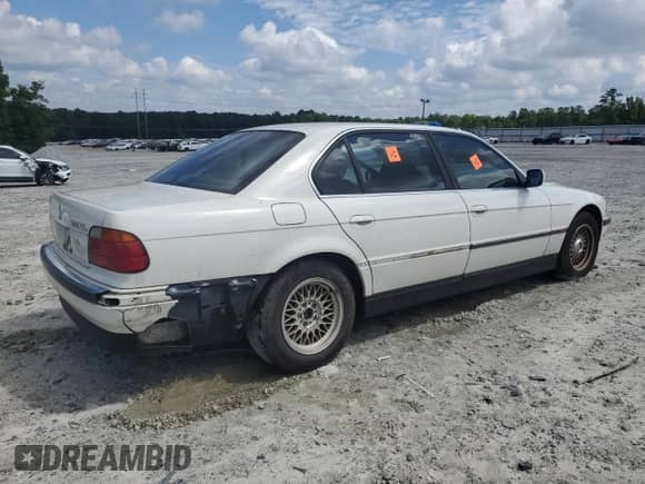 1996 BMW 7 Series 740iL z VIN WBAGJ8328TDL38716, wystawiony jako Copart lot #63390095 z przebiegiem Nie podano mil oraz Nie do naprawy • Non repairable. Historia ofert i sprzedaży dostępna na DreamBid. Obrazek 3.