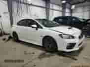 2017 Subaru WRX Limited with VIN JF1VA1L63H9802483, listed as a Copart auction lot 69357305 with 104,450 mi miles and Salvage title. Bid and sale history available at DreamBid. Image 4.