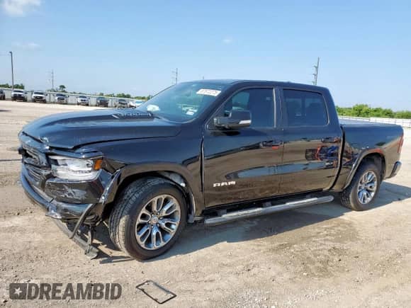 2020 Ram 1500 Laramie с VIN 1C6RREJT6LN100699, выставлен на аукционе Copart как лот 67872275 с пробегом 115 513 миль миль и Списание • Salvage title. История ставок и продаж доступна на DreamBid. Изображение 1.