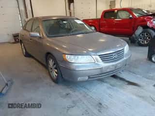 2006 Hyundai Azera SE z VIN KMHFC46F46A106177, wystawiony jako IAAI lot #41643689 z przebiegiem 159 182 mil mil oraz . Historia ofert i sprzedaży dostępna na DreamBid. Obrazek 1.