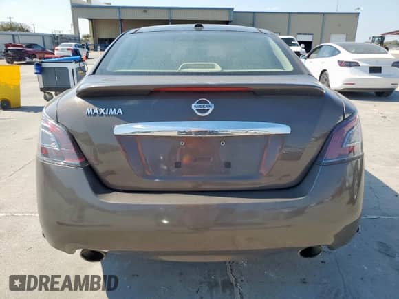 2013 Nissan Maxima SV z VIN 1N4AA5AP8DC844906, wystawiony jako Copart lot #82491755 z przebiegiem 156 815 mil mil oraz Szkoda całkowita • Salvage title. Historia ofert i sprzedaży dostępna na DreamBid. Obrazek 6.