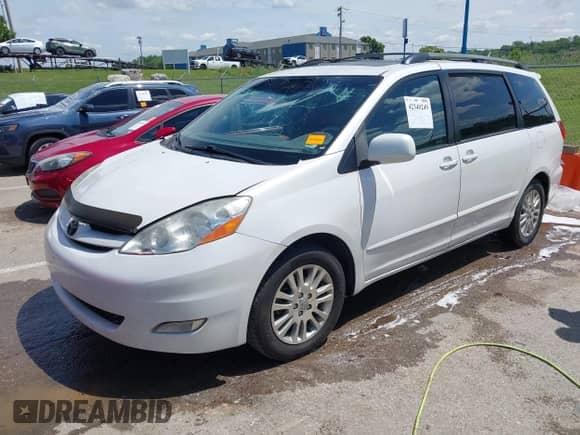 2007 Toyota Sienna XLE z VIN 5TDZK22C87S082670, wystawiony jako IAAI lot #42340249 z przebiegiem 227 064 mil mil oraz . Historia ofert i sprzedaży dostępna na DreamBid. Obrazek 18.