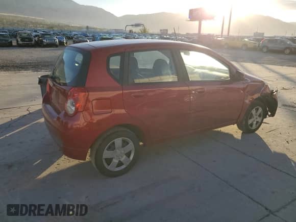 2011 Chevrolet Aveo LS z VIN KL1TD6DE6BB188130, wystawiony jako Copart lot #77906444 z przebiegiem 123 792 mil mil oraz Szkoda całkowita • Salvage title. Historia ofert i sprzedaży dostępna na DreamBid. Obrazek 3.