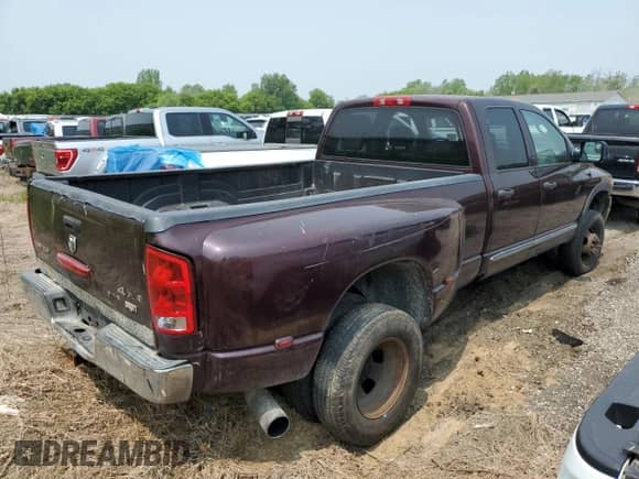 2005 Dodge 3500 SLT with VIN 3D7MS48C05G774954, listed as a Copart auction lot 58351995 with 390,799 mi miles and Salvage title. Bid and sale history available at DreamBid. Image 3.