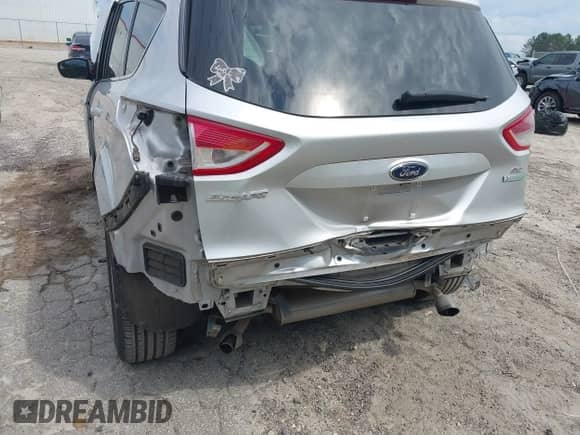 2014 Ford Escape SE z VIN 1FMCU0GX9EUD52462, wystawiony jako IAAI lot #43305348 z przebiegiem 180 007 mil mil oraz . Historia ofert i sprzedaży dostępna na DreamBid. Obrazek 6.