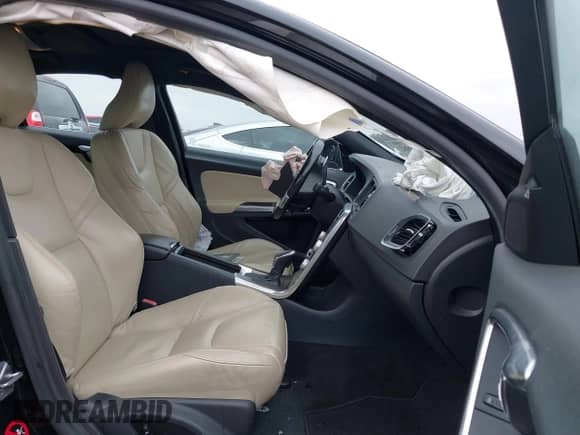 2015 Volvo S60 T5 Drive-E Premier with VIN YV140MFK4F1352447, listed as a IAAI auction lot 42783582 with 72,780 mi miles and . Bid and sale history available at DreamBid. Image 5.