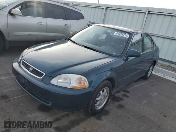 1997 Honda Civic z VIN JHMEJ854XVS002832, wystawiony jako Copart lot #84455214 z przebiegiem 205 806 mil mil oraz Czysty tytuł • Clean title. Historia ofert i sprzedaży dostępna na DreamBid. Obrazek 1.