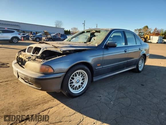 2000 BMW 5 Series 528i с VIN WBADM6345YGU15211, выставлен на аукционе Copart как лот 85207655 с пробегом Не указан миль и Списание • Salvage title. История ставок и продаж доступна на DreamBid. Изображение 1.